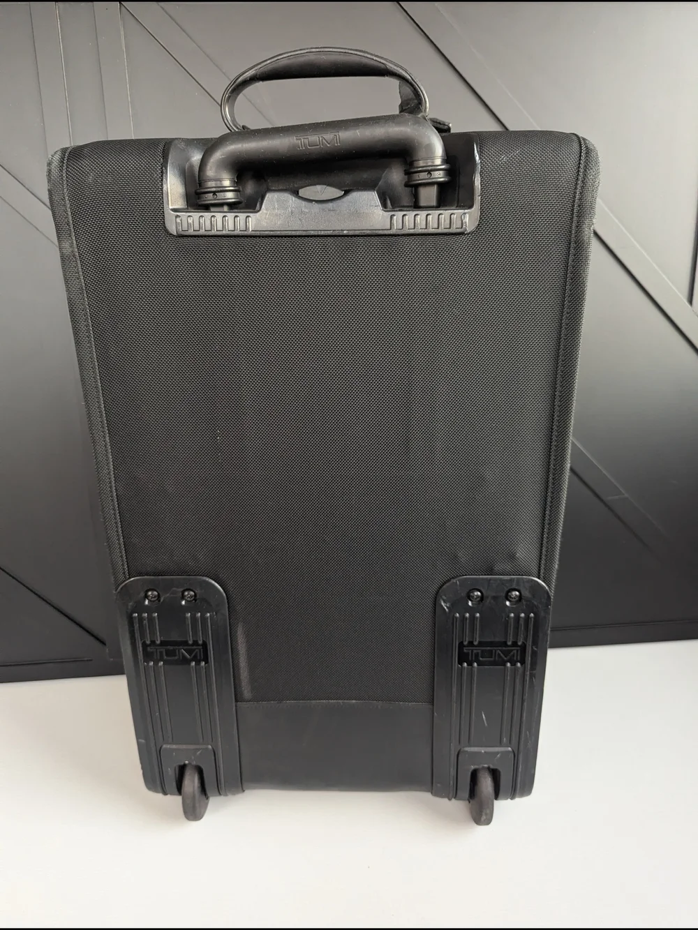 Tumi Black Men’s Carry-On Rolling Travel Bag